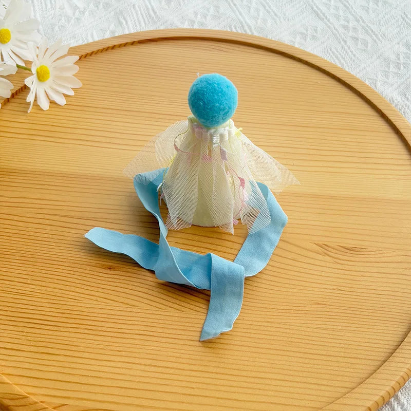 Blue birthday party hat in soft tulle with matching blue ribbon