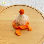 Birthday party hat in vibrant orange with pom-pom and tulle