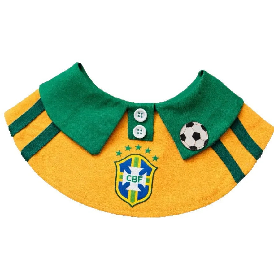 Flat-lay of the green and yellow soccer-inspired pet bib with football charm and buttons