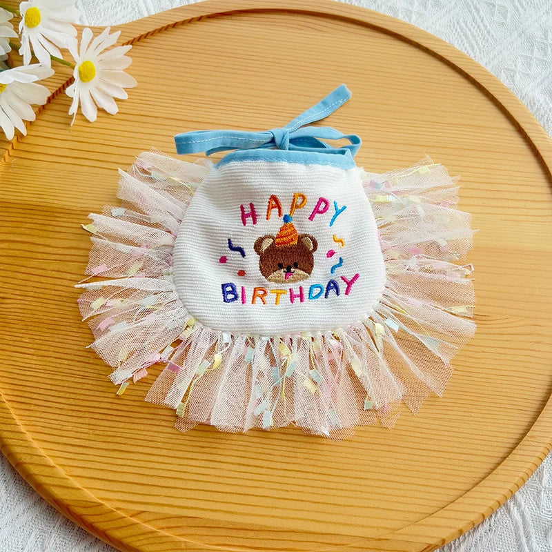 Happy birthday bear embroidered bib in blue with holographic trim