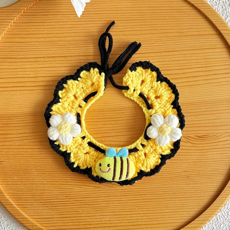 Close-up of artisan honeybee knit pet collar in yellow